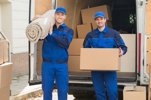 Professional Wennington removals team loading furniture for transport